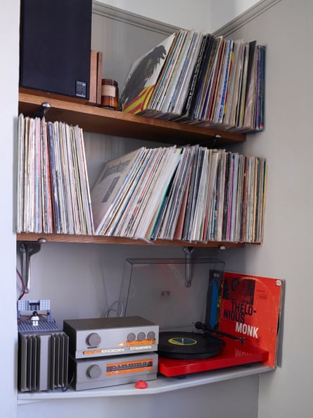 Record player and albums on shelves