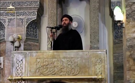 Abu Bakr al-Baghdadi making what would be his first public appearance at a mosque in Mosul, in a still from a video recording posted on the internet on 5 July 2014.