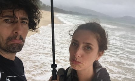 Jessica Knappett and partner during a rain squall in Thailand.