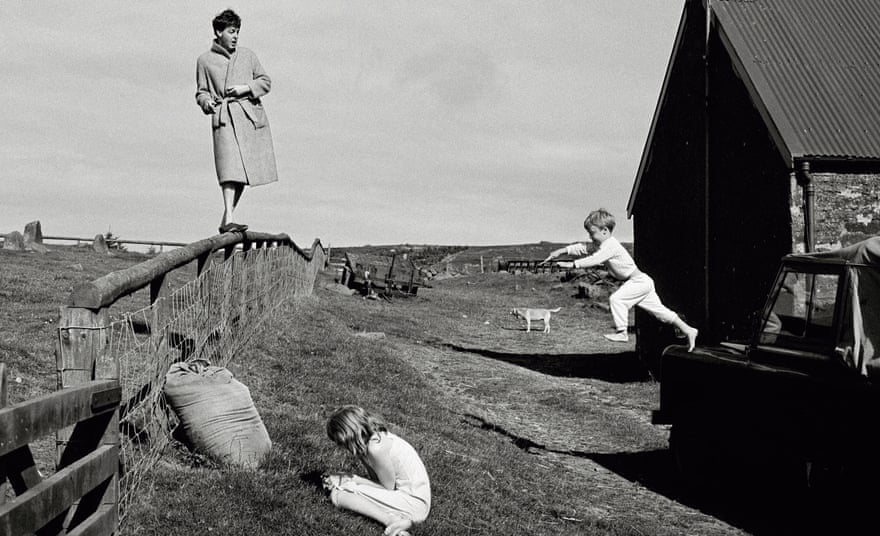Paul McCartney with his children Stella (left) and James, in Scotland, 1982.