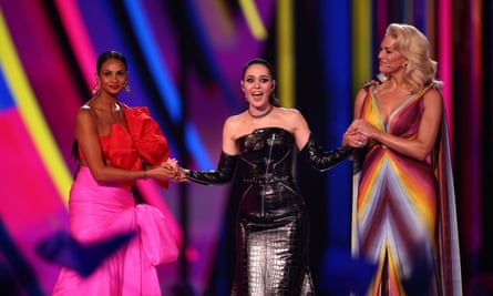 The Eurovision semi-final presenters Alesha Dixon, Julia Sanina and Hannah Waddingham on stage.
