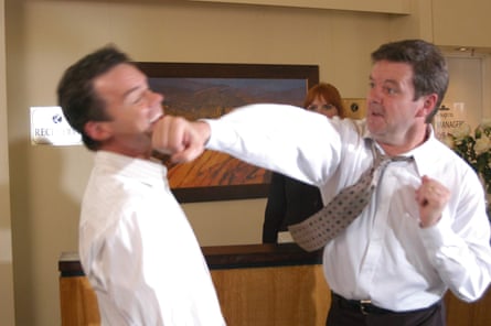 Paul Robinson gets punched by David Bishop (Kevin Harrington) in Neighbours