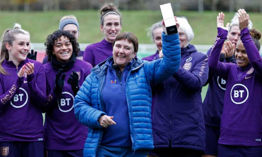 Carol Thomas, pictured with last November’s squad after receiving an award from the FA, says today’s Lionesses are ‘well-grounded’.