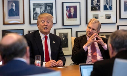 Sulzberger Jr listens during a meeting between editors and reporters and then president-elect Donald Trump, at the New York Times in November 2016.