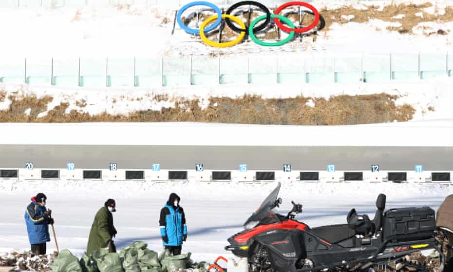 Workers prepare the Olympics shooting range of the National Biathlon Center on 15 January in Zhangjiakou, China. 