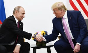 Trump with Vladimir Putin at the G20 summit in Osaka on Friday.