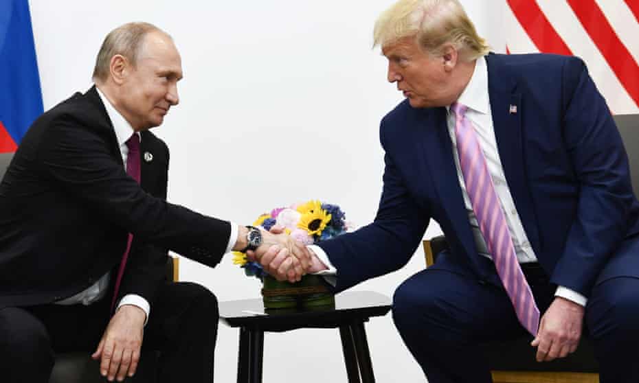 Vladimir Putin and Donald Trump at the G20 summit in Osaka in June.