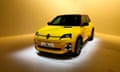 A yellow electric Renault 5