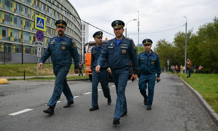 Security officers are seen at the City Clinical hospital No. 67 near the site of an attempted attack by a Ukrainian drone in Moscow, Russia on 11 August 2023.