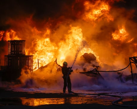 'Everything flew': Ukrainians describe Russian attack on apartment block – video