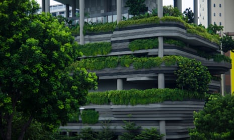 Modern skyscraper wall with green terraces, Singapore