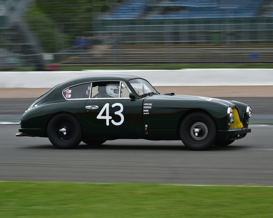 Verhofstadt races his Aston Martin  in the Silverstone Classic, 2017.
