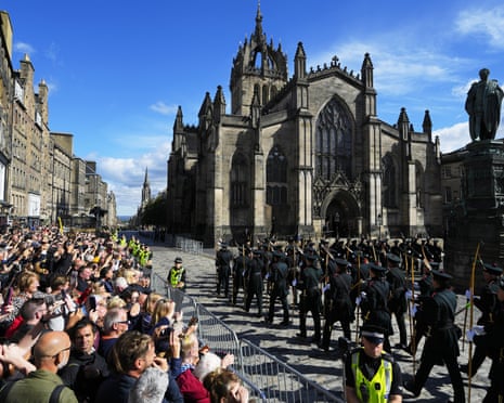 Crowds wait to catch a glimpse of the Queen’s coffin in Edinburgh last week.