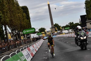 Chavanel, competing his 18th and last Tour de France, arrives on the Champs-Elysees.
