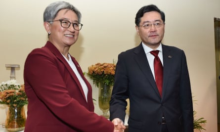 Penny Wong shaking hands with Qin Gang