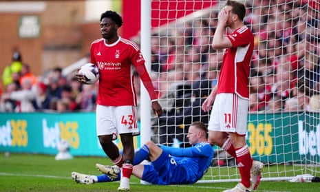 Nottingham Forest’s Ola Aina and Chris Wood show their disappointment as Manchester City open the scoring last Sunday