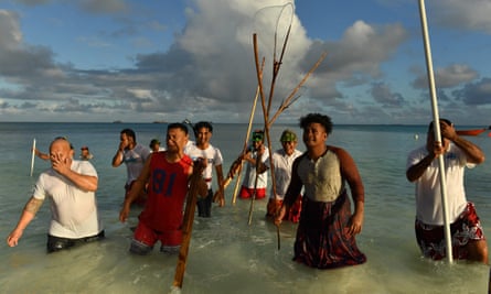 Traditional fishing methods are used to round up fish during the forum.