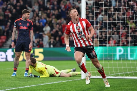 Dan Ballard has the ball in the back of the Forest net.