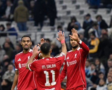 Cody Gakpo,Mohamed Salah,Ryan GravenberchLiverpool's Cody Gakpo, right, celebrates with Liverpool's Mohamed Salah, centre, and Liverpool's Ryan Gravenberch after scoring his side's third goal during the Champions League opening phase soccer match between Marseille and Liverpool in Marseille, France, Wednesday, Jan. 21, 2026. (AP Photo/Philippe Magoni)