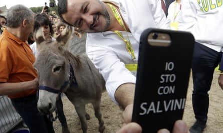 Matteo Salvini takes a selfie with a donkey at an event in Rome’s Circus Maximus