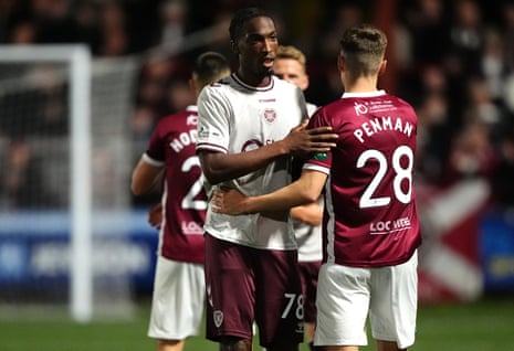 Hearts defender Laurent Mendy shakes hands with Stenhousemuir’s Callum Penman following his side’s League Cup quarter-final win.