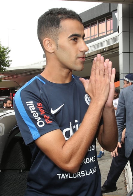 Hakeen al-Araibi gestures to supporters upon arrival at Melbourne airport on Tuesday.