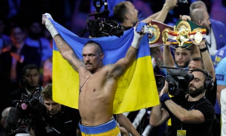 Oleksandr Usyk celebrates after beating Britain’s Anthony Joshua in Saudi Arabia in August 2022
