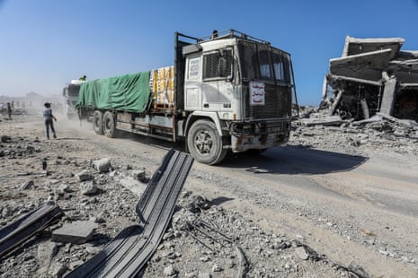 Trucks carrying food and medical supplies belonging to the World Food Programme (WFP) enter Gaza through the Kerem Shalom border crossing on Thursday.