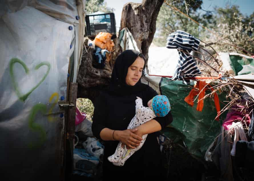 Resident Halime, from Afghanistan, with her 12-day-old daughter