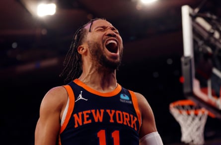 Jalen Brunson #11 of the New York Knicks reacts after scoring during the second half of a January game against the Denver Nuggets at Madison Square Garden.