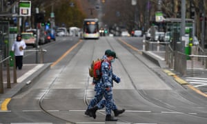 Defence force personnel patrol the streets of Melbourne