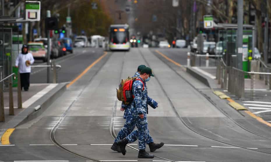 Defence force personnel patrol the streets of Melbourne