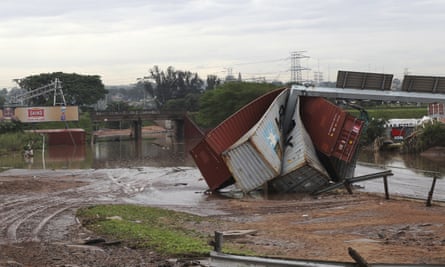 Shipping containers carried away and left in a pile by the floods in Durban