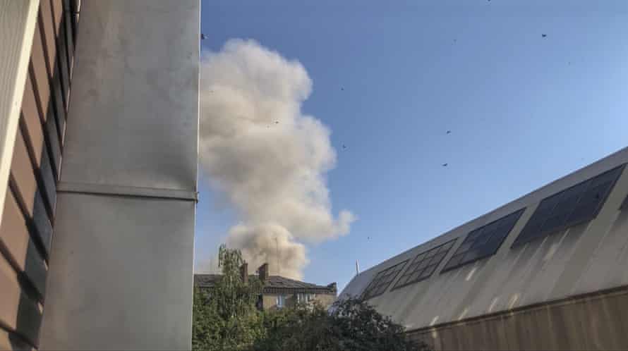 Smoke rises from an explosion following a suspected missile strike on a civilian area in Bakhmut.