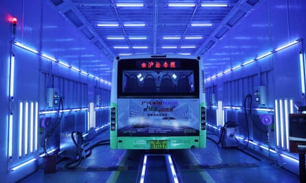 A bus is being disinfected by ultraviolet light in Shanghai