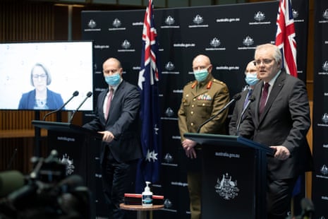 Prime Minister Scott Morrison at a press conference with the Treasurer Josh Frydenberg, CMO Paul Kelly and head of the Covid 19 task force Lieutenant General John Frewen in the main committee room of Parliament House