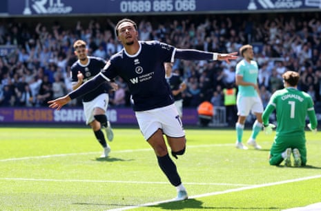 Femi Azeez of Millwall celebrates scoring his team's first goal.