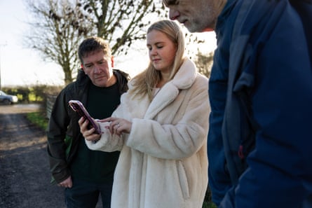 Sam (right) with wildlife tracker, Darren Parkin, and Molly Laird, who took a video a wallaby she spotted while driving home