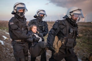 Erkelenz, Germany, Police officers detain Greta Thunberg at a demonstration