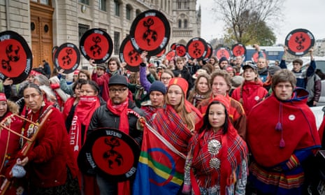 Indigenous activists lead the Red Lines action in Paris at the end of the UN climate negotiations on December 12, 2015.