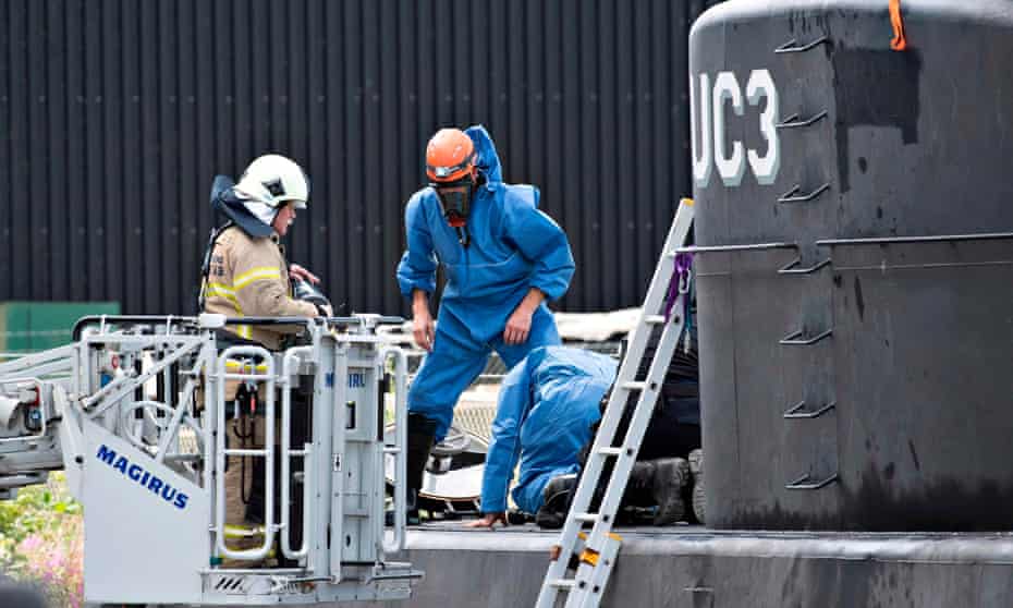 Police inspect Peter Madsen’s submarine UC3 Nautilus in Copenhagen harbour after journalist Kim Wall’s disappearance.