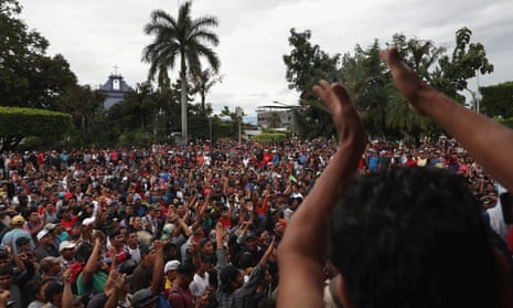Migrant Caravan Prepares To Cross Into Mexico<br>TECUN UMAN, GUATEMALA - OCTOBER 19: Members of an immigrant caravan gather before attempting to cross the Guatemalan border into Mexico on October 19, 2018 in Tecun Uman, Guatemala. The caravan of thousands of Central Americans, mostly from Honduras, hopes to eventually reach the United States. U.S. President Donald Trump has threatened to cancel the recent trade deal with Mexico and withhold aid to Central American countries if the caravan isn’t stopped before reaching the U.S. (Photo by John Moore/Getty Images)