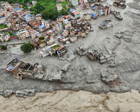 Nepal flash flood: more than 1,500 missing, mostly tourists, after disaster kills at least 165 at Tibet border | Nepal-Tibet flood disaster | The Guardian