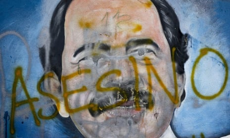 The word ‘asesino’ (murderer) is painted over a mural of Daniel Ortega in Managua, Nicaragua. 