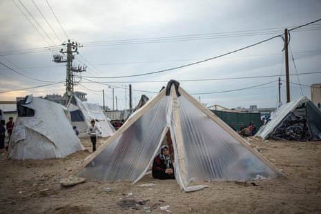 Palestinians displaced by the Israeli ground offensive on the Gaza Strip set up a tent camp in the Muwasi area.