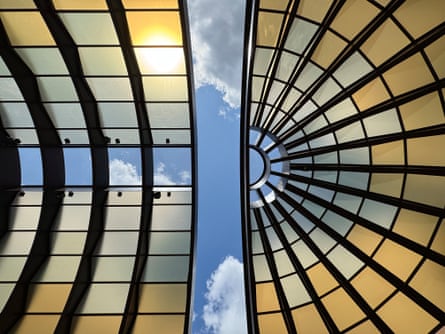 Moving at imperceptible speed … the brown tinted roof of the pavilion.