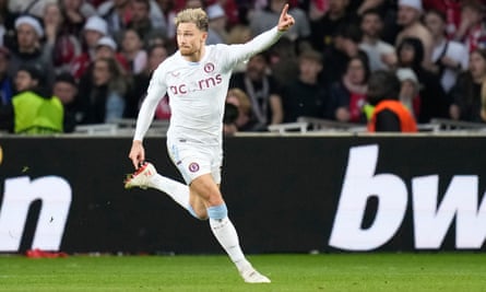 Matty Cash celebrates after scoring during the Europa Conference League quarter-final second leg match between Lille and Aston Villa