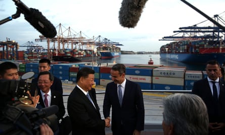 President Xi Jinping of China and the Greek prime minister, Kyriakos Mitsotakis, shake hands in Piraeus