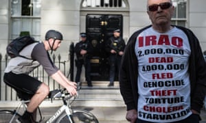 Protester Michael Culver, 78, wearing an Iraq t-shirt stands outside the London home of Tony Blair.