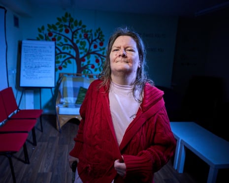 Ruth Cookson standing near a large pad of paper mounted on a stand